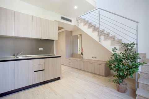 Apartment, 1 Bedroom | Private kitchenette | Fridge, microwave, stovetop, dishwasher