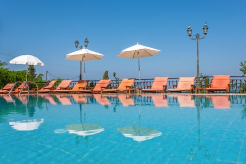 Seasonal outdoor pool, pool umbrellas, sun loungers