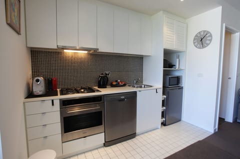 1 Bedroom Apartment | Private kitchen | Fridge, microwave, oven, stovetop