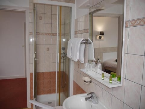 Shower, free toiletries, hair dryer, towels