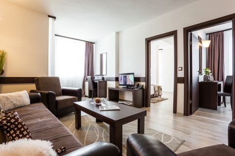 Apartment, 2 Bedrooms | Living room | 32-inch flat-screen TV with satellite channels, TV