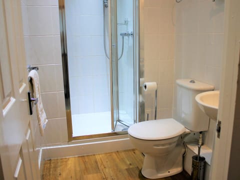 Twin Room | Bathroom | Hair dryer, towels, soap, toilet paper