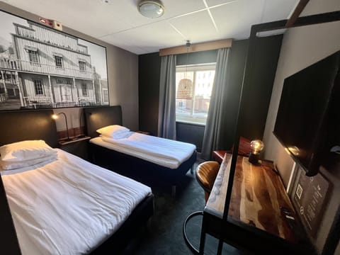 Economy Twin Room, 2 Twin Beds | Desk, blackout drapes, soundproofing, free WiFi