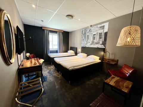 Standard Triple Room | Desk, blackout drapes, soundproofing, free WiFi