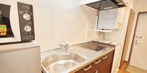 (Condominium Type) Twin Room A | Private kitchen | Microwave, cookware/dishes/utensils