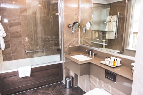 Combined shower/tub, designer toiletries, hair dryer, bathrobes