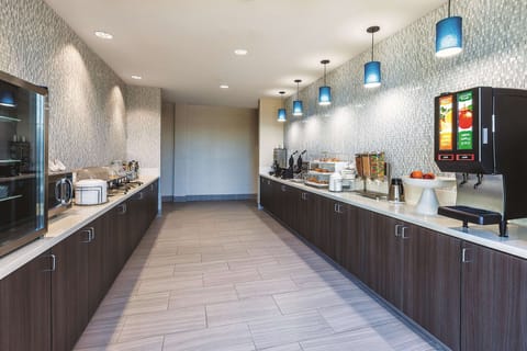 Free daily self-serve breakfast