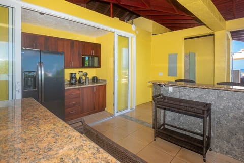 Condo, 3 Bedrooms | Private kitchen | Fridge, coffee/tea maker, toaster, dining tables