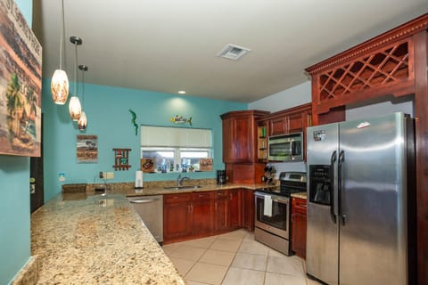 Condo, 2 Bedrooms | Private kitchen | Fridge, microwave, oven, dishwasher