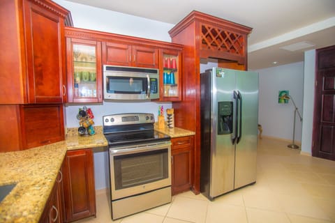 Condo, 2 Bedrooms | Private kitchen | Fridge, microwave, oven, dishwasher