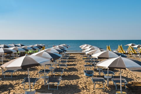 On the beach, beach umbrellas, beach volleyball
