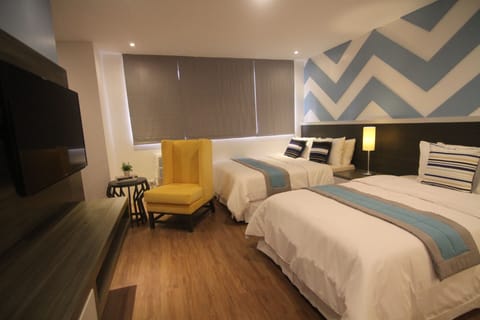 Deluxe Triple Room, Multiple Beds, Non Smoking | Individually decorated, individually furnished, free WiFi, bed sheets