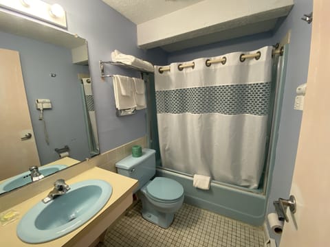 Deluxe Room, 2 Double Beds | Bathroom | Shower, free toiletries, hair dryer, towels