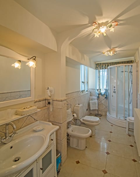 Free toiletries, hair dryer, bidet, towels