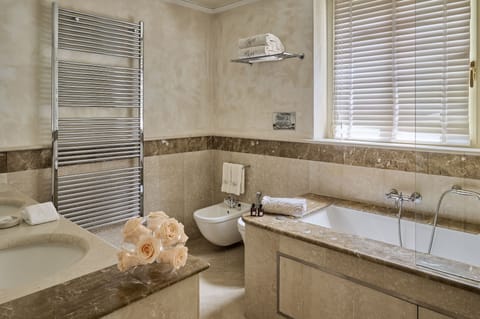 Premium Suite | Bathroom | Combined shower/tub, free toiletries, hair dryer, bathrobes