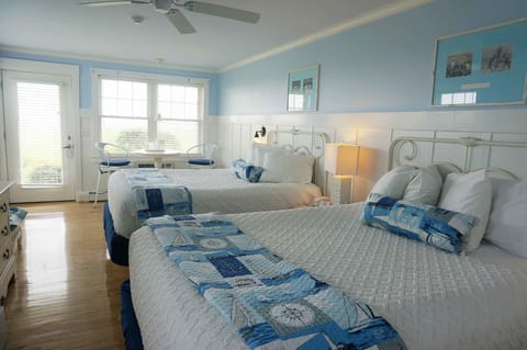 Classic Room, 2 Queen Beds, Oceanfront | Desk, iron/ironing board, cribs/infant beds, rollaway beds