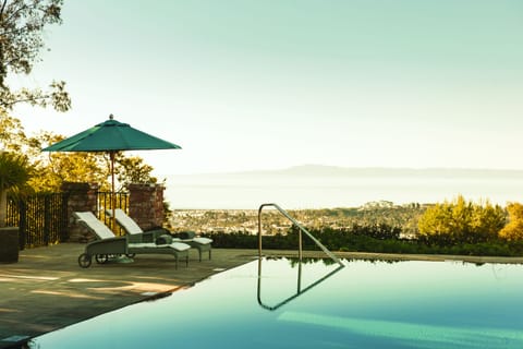 Outdoor pool, pool umbrellas, sun loungers