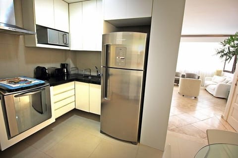 Apartment (D041) | Private kitchen | Fridge, microwave, stovetop, cookware/dishes/utensils