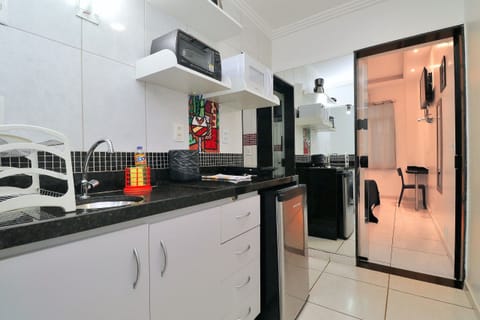 Economy Apartment (C031) | Private kitchen | Fridge, microwave, coffee/tea maker, cookware/dishes/utensils