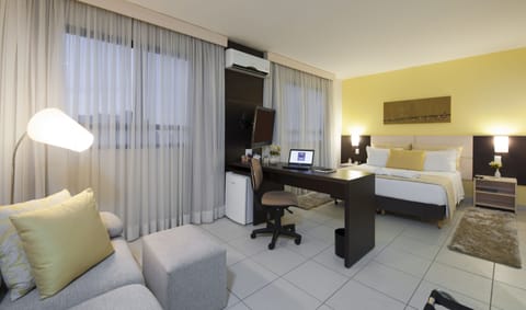 Deluxe Suite, 1 Queen Bed, Non Smoking | In-room safe, desk, free WiFi