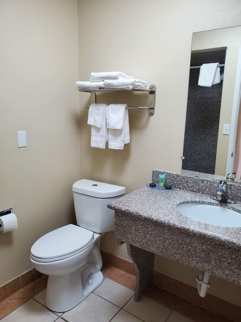 Room, 2 Queen Beds, Non Smoking | Bathroom | Combined shower/tub, hair dryer, towels