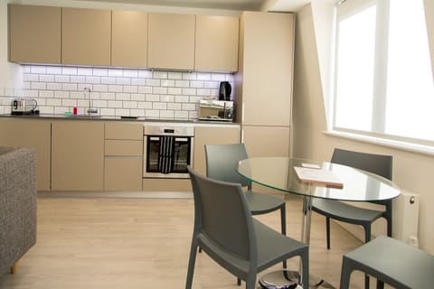 Executive Apartment, 2 Bedrooms | Private kitchen | Full-size fridge, microwave, oven, stovetop