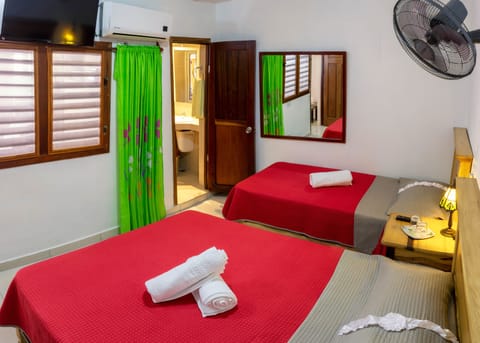 Economy Double or Twin Room | Minibar, iron/ironing board, WiFi, bed sheets