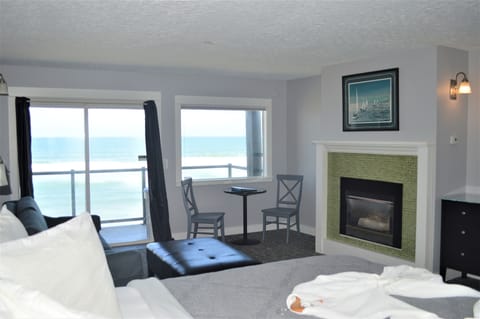 Romantic Suite, Hot Tub, Oceanfront (Accessed via Stairs) | Living area | 20-inch flat-screen TV with cable channels, TV