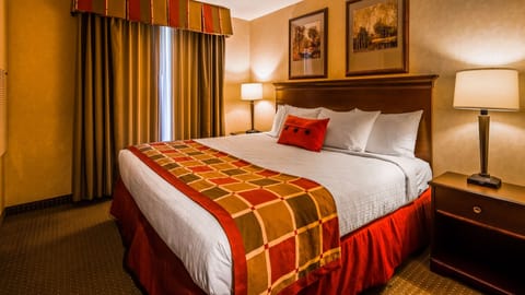 Suite, 1 King Bed, Non Smoking, Refrigerator & Microwave | In-room safe, desk, laptop workspace, blackout drapes