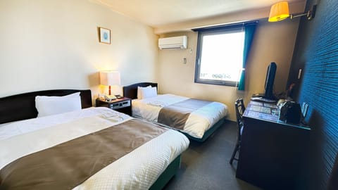 Desk, laptop workspace, free WiFi, bed sheets