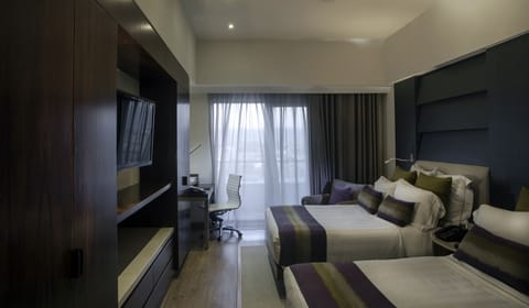 Deluxe Room, 2 Double Beds | Premium bedding, down comforters, free minibar, in-room safe