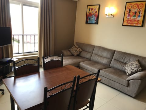 Comfort Apartment, 2 Bedrooms, City View, Executive Level | Living room | 32-inch LED TV with cable channels, TV