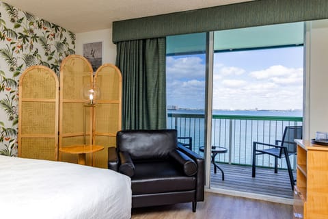 Deluxe Bayfront Double with Balcony | In-room safe, desk, blackout drapes, iron/ironing board