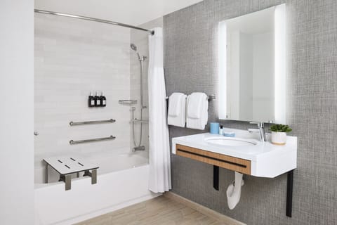 Coastal Double Queens ADA | Bathroom | Designer toiletries, hair dryer, bathrobes, towels