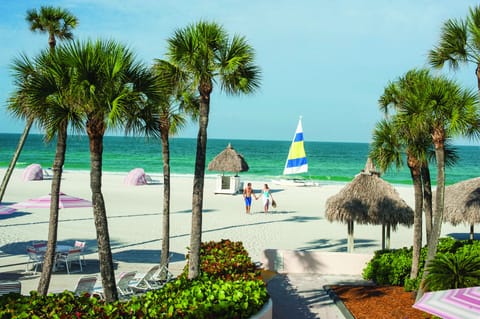 Private beach, white sand, sun loungers, beach umbrellas