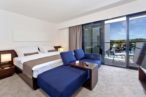 Premium Room, Balcony, Sea View | Minibar, in-room safe, desk, blackout drapes