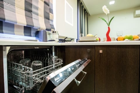 Apartment, 2 Bedrooms | Private kitchenette | Fridge, microwave, oven, stovetop