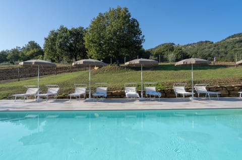 Seasonal outdoor pool, open 9 AM to 8 PM, sun loungers