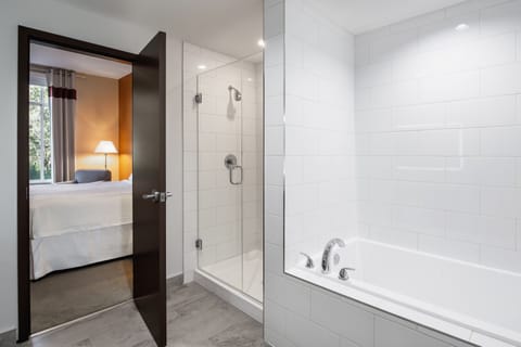 Suite, 1 Bedroom | Bathroom | Combined shower/tub, free toiletries, hair dryer, towels