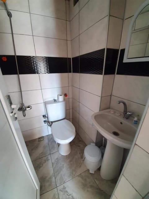 Shower, free toiletries, hair dryer, slippers