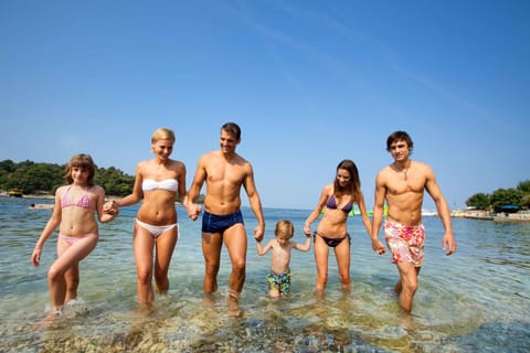 On the beach, sun loungers, beach umbrellas, beach volleyball