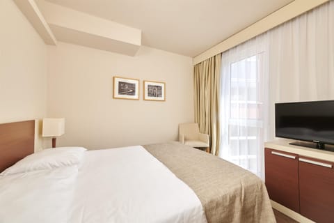 Economy Room | 1 bedroom, desk, blackout drapes, free WiFi