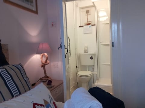 Basic Double Room, 1 Queen Bed | Bathroom | Shower, free toiletries, hair dryer, towels