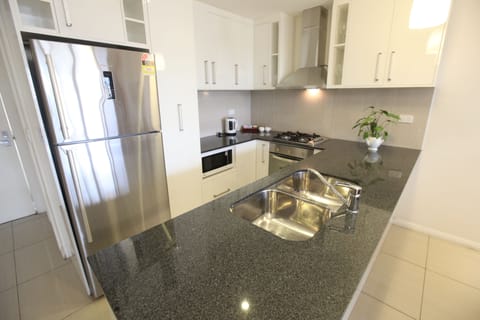 Exclusive Apartment, 2 Bedrooms | Private kitchen | Full-size fridge, microwave, oven, stovetop