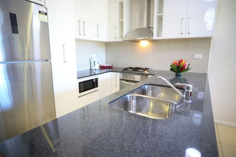 Exclusive Apartment, 2 Bedrooms | Private kitchen | Full-size fridge, microwave, oven, stovetop