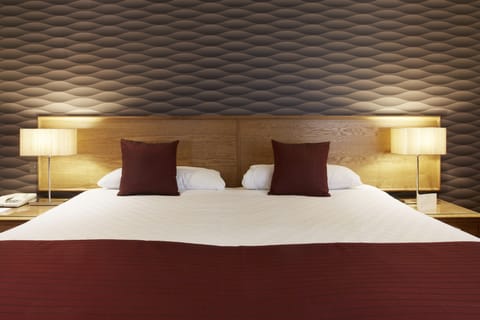 Premium bedding, in-room safe, desk, soundproofing