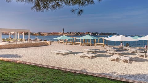 Beach nearby, sun loungers, beach umbrellas, beach volleyball