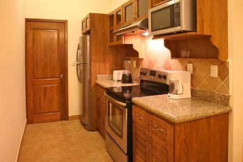 Family Condo | Private kitchen | Fridge, microwave