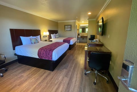 Room, 2 Queen Beds, Non Smoking | In-room safe, desk, blackout drapes, free WiFi