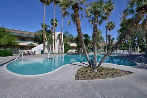 2 outdoor pools, open 7:00 AM to 10:00 PM, pool umbrellas, sun loungers